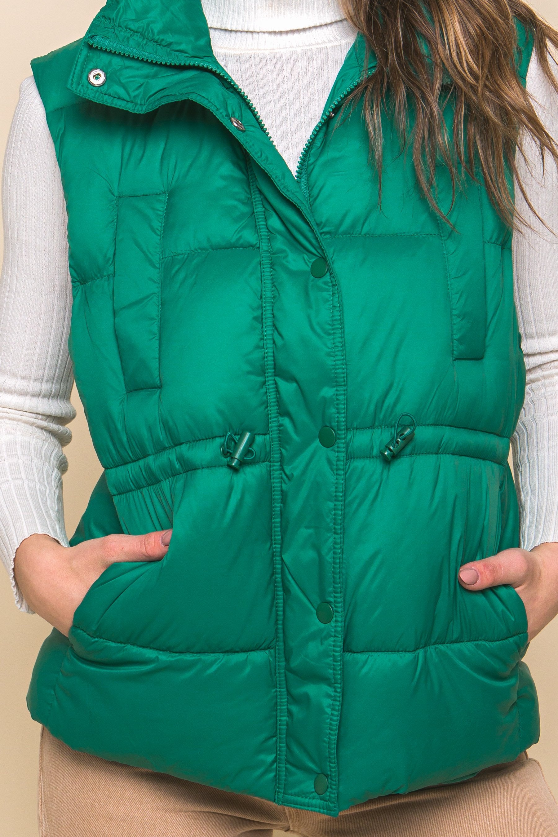 Women's Color Zip up button puffer vest with waist toggles