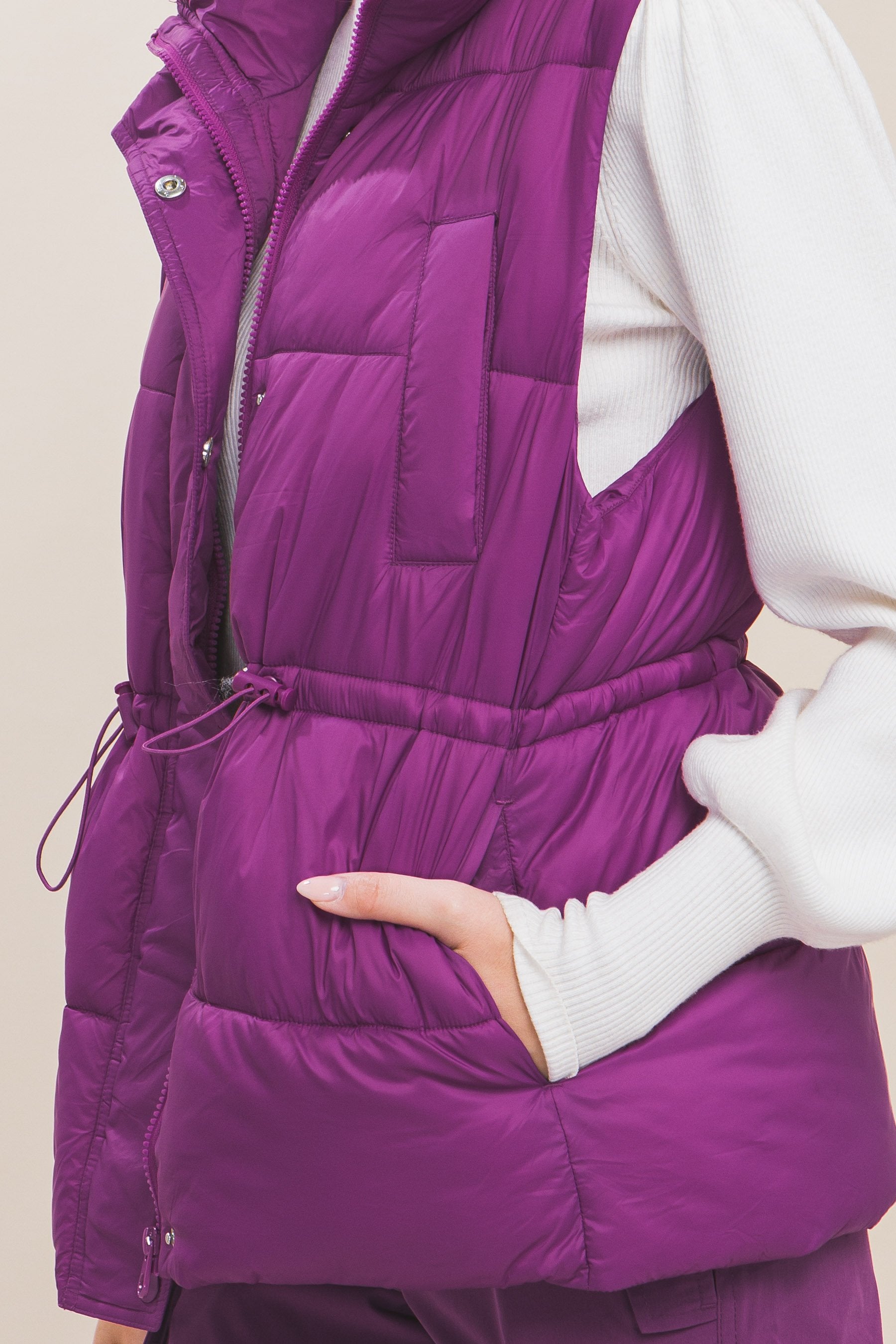 Women's Color Zip up button puffer vest with waist toggles